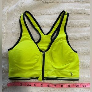 Yellow Sports Bra with Black Trim dangling size medium